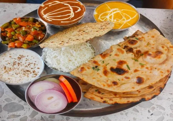Shahi Paneer Mix Veg Dal Tadka Veg Raita 4Roti Salad Jeera Rice Papad